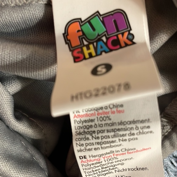 1 sleeve fringe dress, a light blue fringe in light gray fabric. Real cute. - Picture 3 of 6